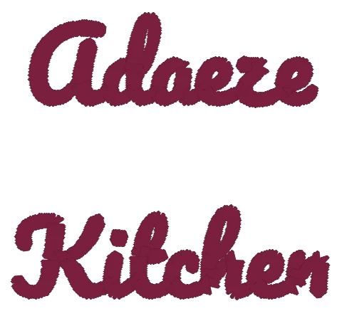 The words Adaeze Kitchen stitched in a satin script